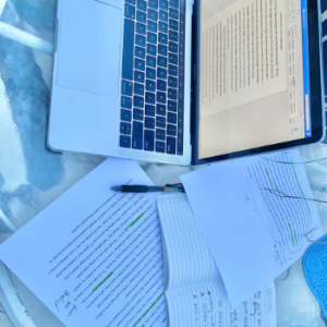 Yasmeen's laptop and handwritten notes